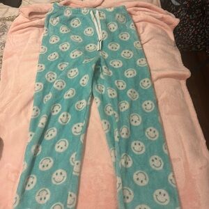 Super comfy teal pajama pants with smiley faces